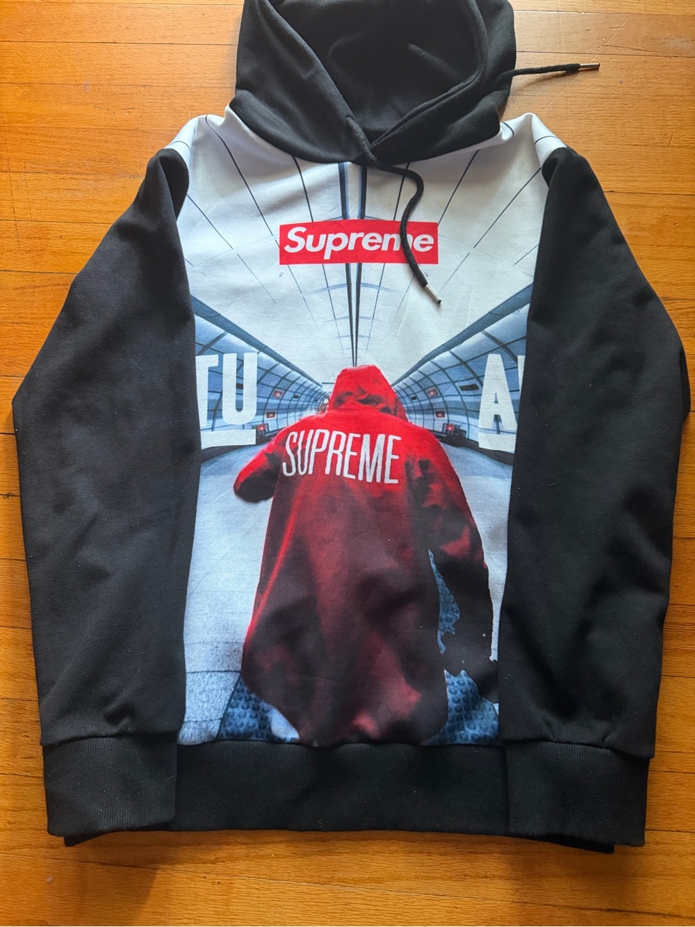 Supreme Black Hoodie with Red Logo Tag